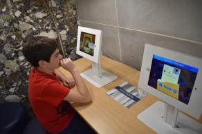 Child using the Civics Corner iPad